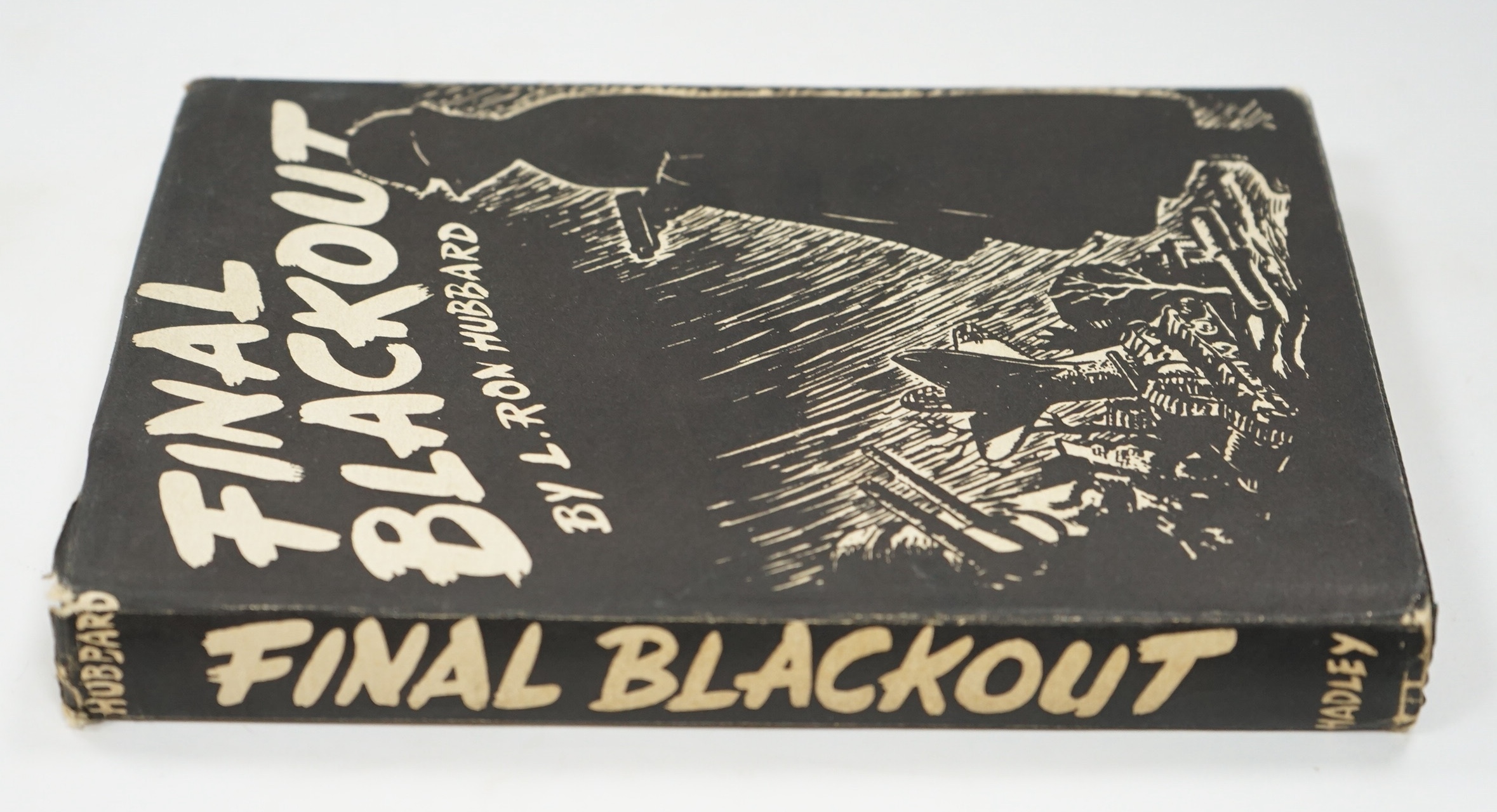 Hubbard, L. Ron - Final Blackout, 1st edition, 8vo, original pebbled black cloth, in unclipped d/j, Hadley Publishing Co., Rhode Island, 1940.